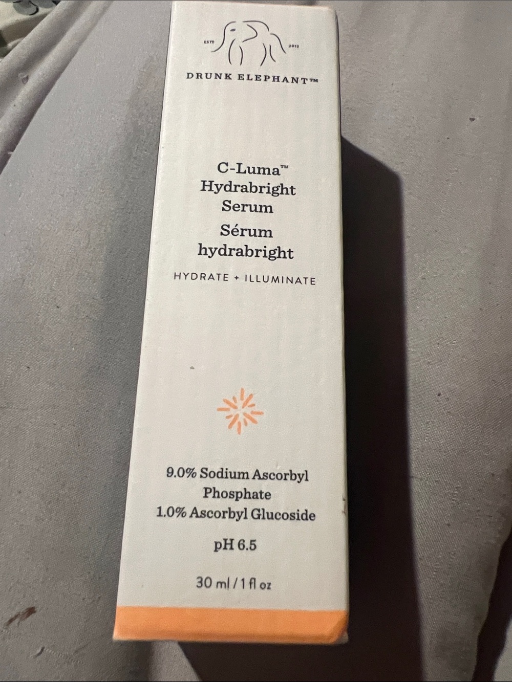 Drunk Elephant C-Luma Hydrabright Serum - White with Orange Accent